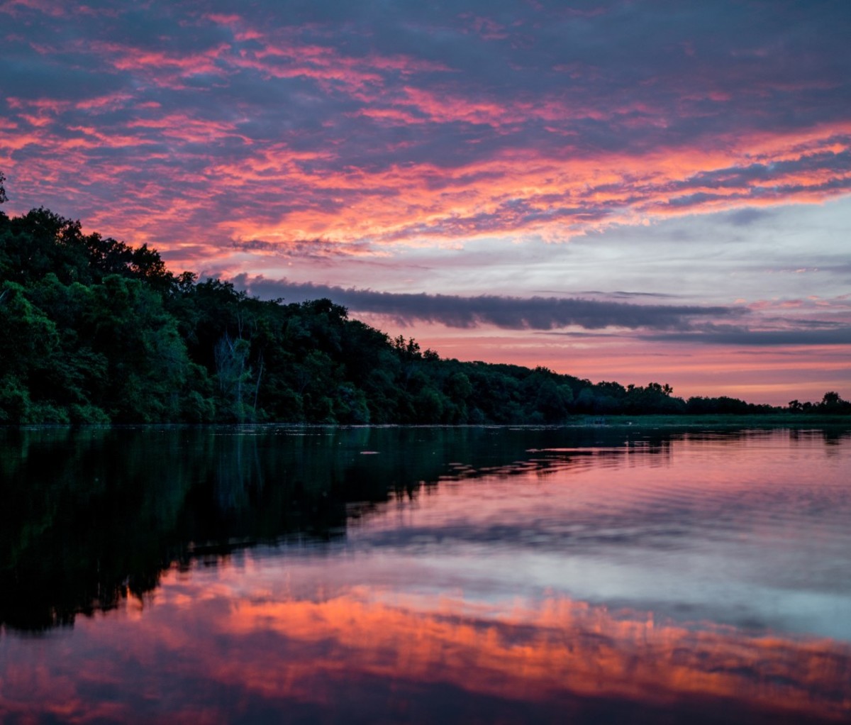 A sunrise or sunset view of a Kansas lake near Topeka.